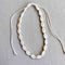 Ketting met kauri schelpen TIMOR